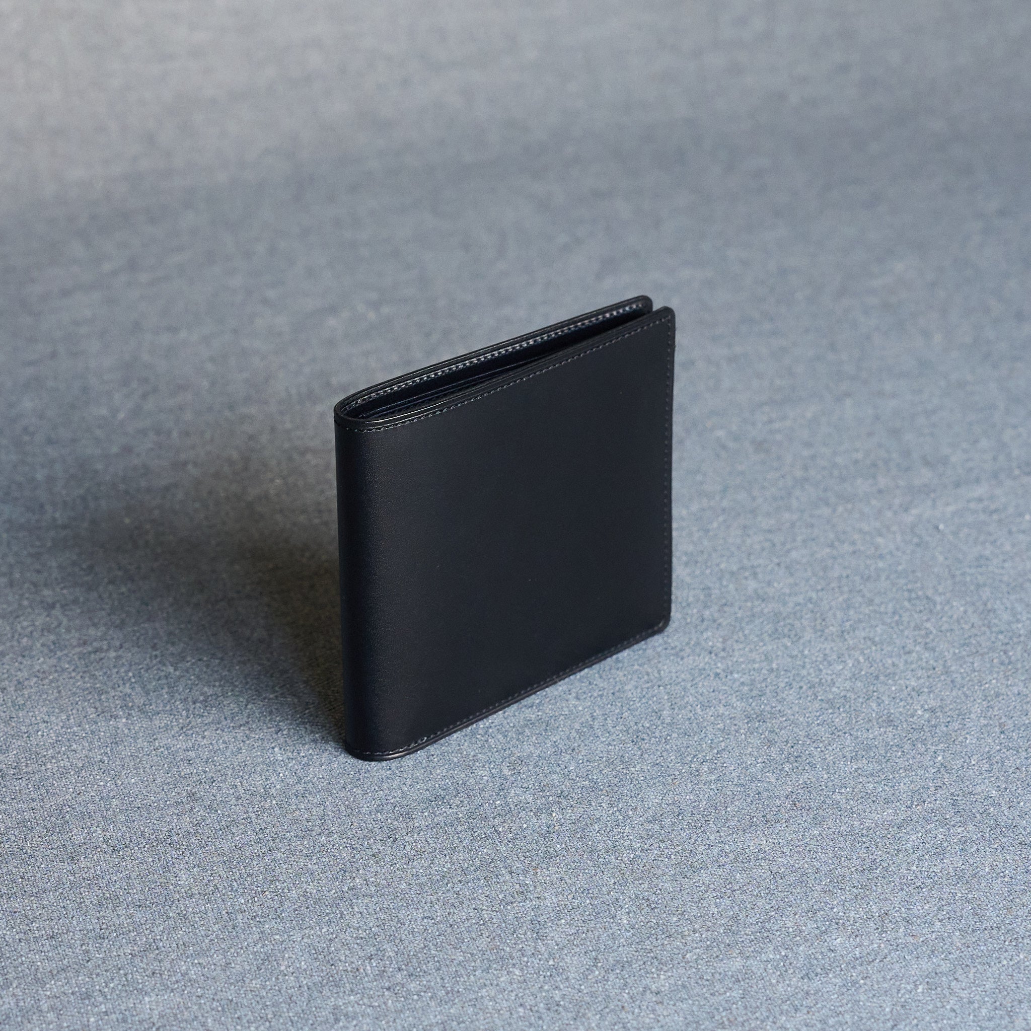 Bifold Wallet in black smooth calfskin